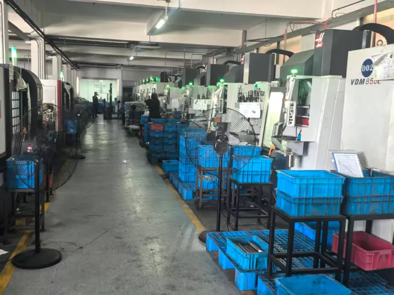 GuTuBao factory floor featuring Haas CNC machining centers for precision OEM manufacturing.