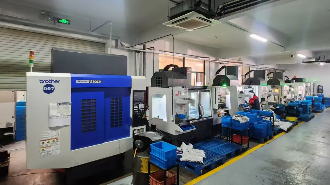 Precision CNC machining centers at GUTUBAO factory ensuring 0.01mm tolerance for OEM coating equipment production line components.