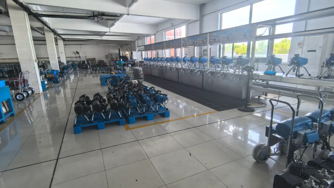 GUTUBAO factory floor showing high-pressure testing lines and assembled motors for OEM fireproofing spray equipment